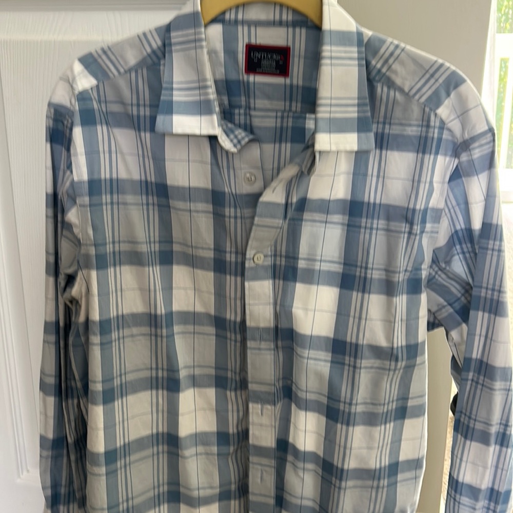 Blue and white pattern untuckit. Love this shirt but put on a few pounds so…